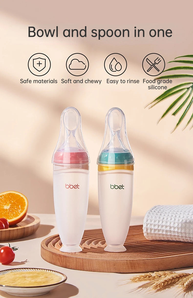 Squeeze Type Feeding Bottle With Silicone Training Spoon